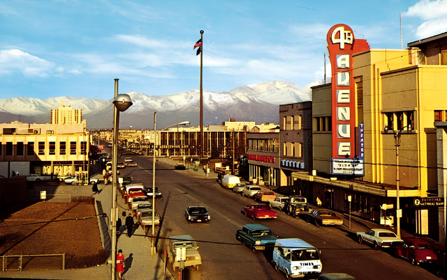 The town of Anchorage, Alaska, surrounded by mountains to the east and Cook Inlet to the west. anchorage alaska