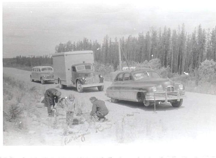The task of fixing flat tires. early days on the highway