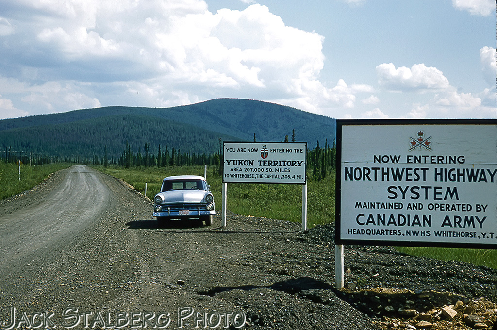 Signs that tell travelers they are entering the Yukon Territory in Canada. 1950s signs on the highway