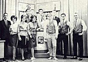 Show crew poses with the TV show host, Jim Roach varsity show crew