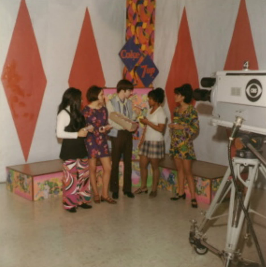 Host Mike Ray poses with the TV show's staff dancers. varsity Show host and staff dancers