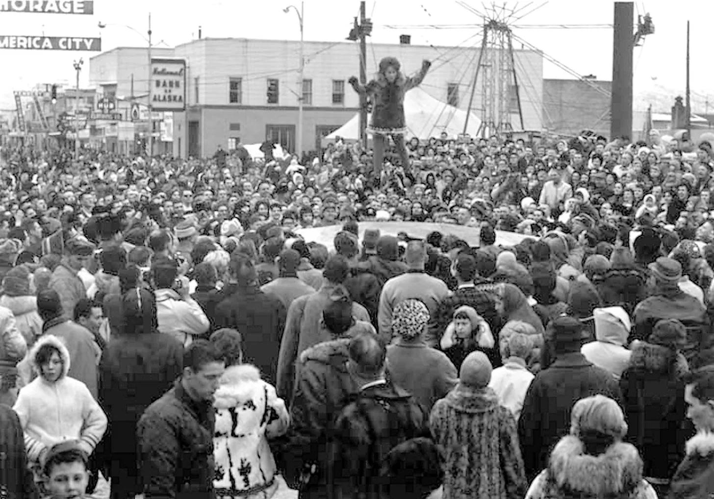 Blanket toss during the Fur Rendezvous in Anchorage, Alaska. The world's largest winter carnival. fur rendezvous blanket toss